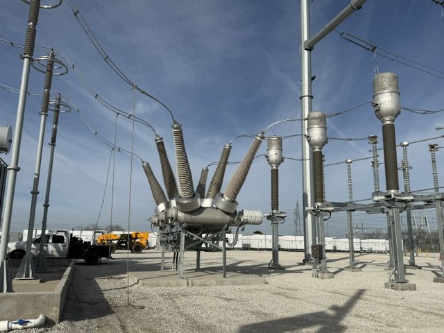 Gas-insulated switchgear and high-voltage interconnection at a commissioned substation.